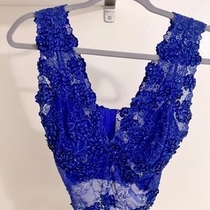 Sexy BEBE purple top, amazing beaded details!